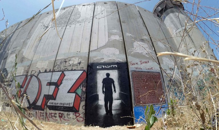 Painting the separating wall in Bethlehem